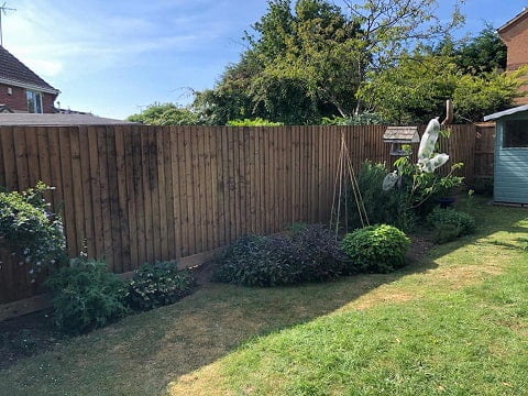 Wooden close board fence replacement.